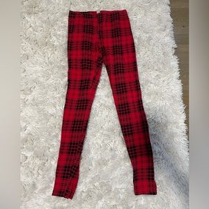 Red and black plaid leggings by Forever 21